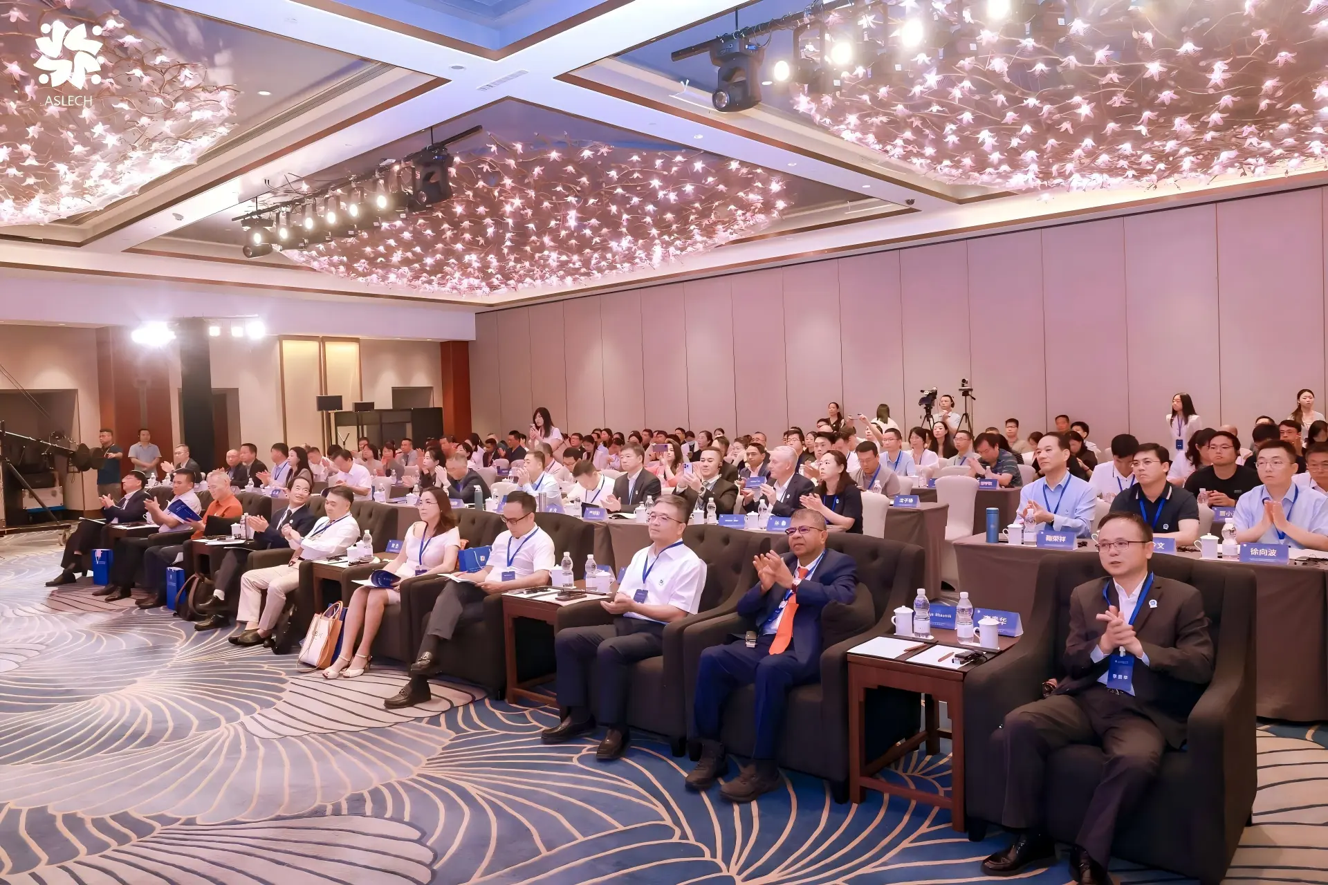 Audience and front-row guests at an ASLECH event
